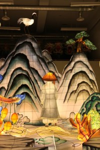 A practitioner, but notice how even on a barren peak, a pine tree is fully alive, as the crane on the other peak.